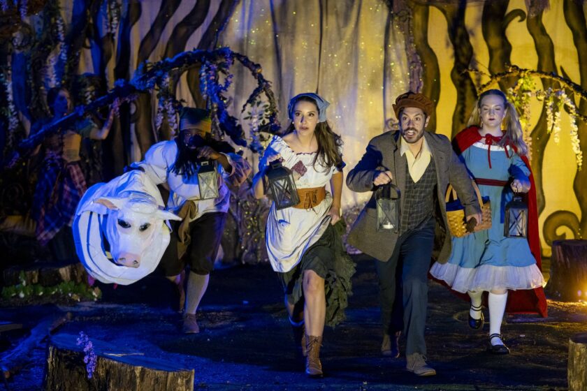 Cast of Into the Woods production act on stage