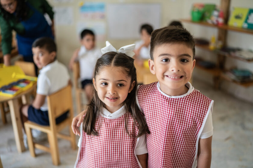 Portrait of friends in the classroom at school