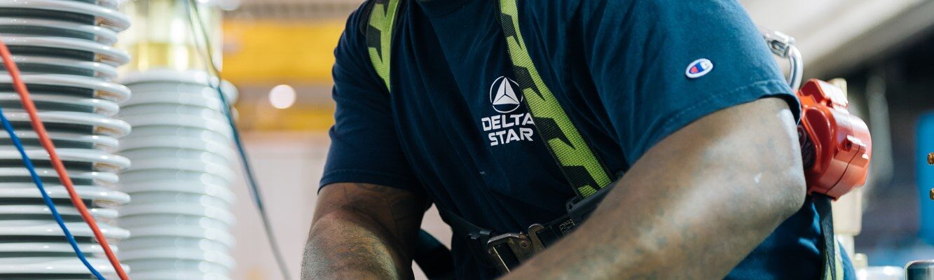 A Delta Star employee works at the factory.