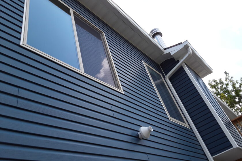 Blue vinyl siding on a house