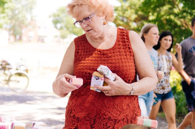 A woman shops at a local outdoor market.
